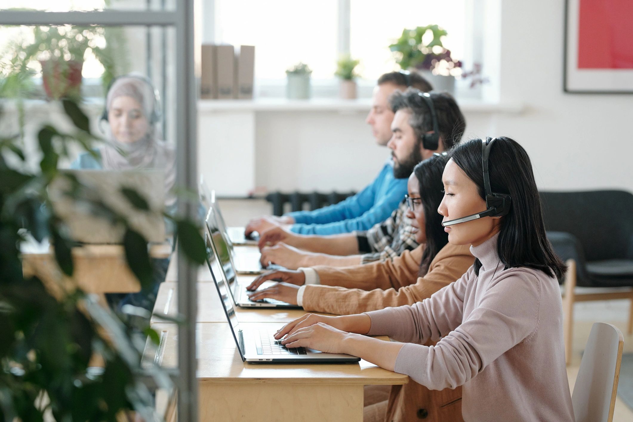 Support specialists working with headsets